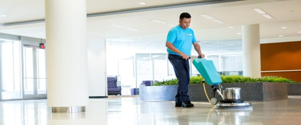 Man vacuuming the ground floor