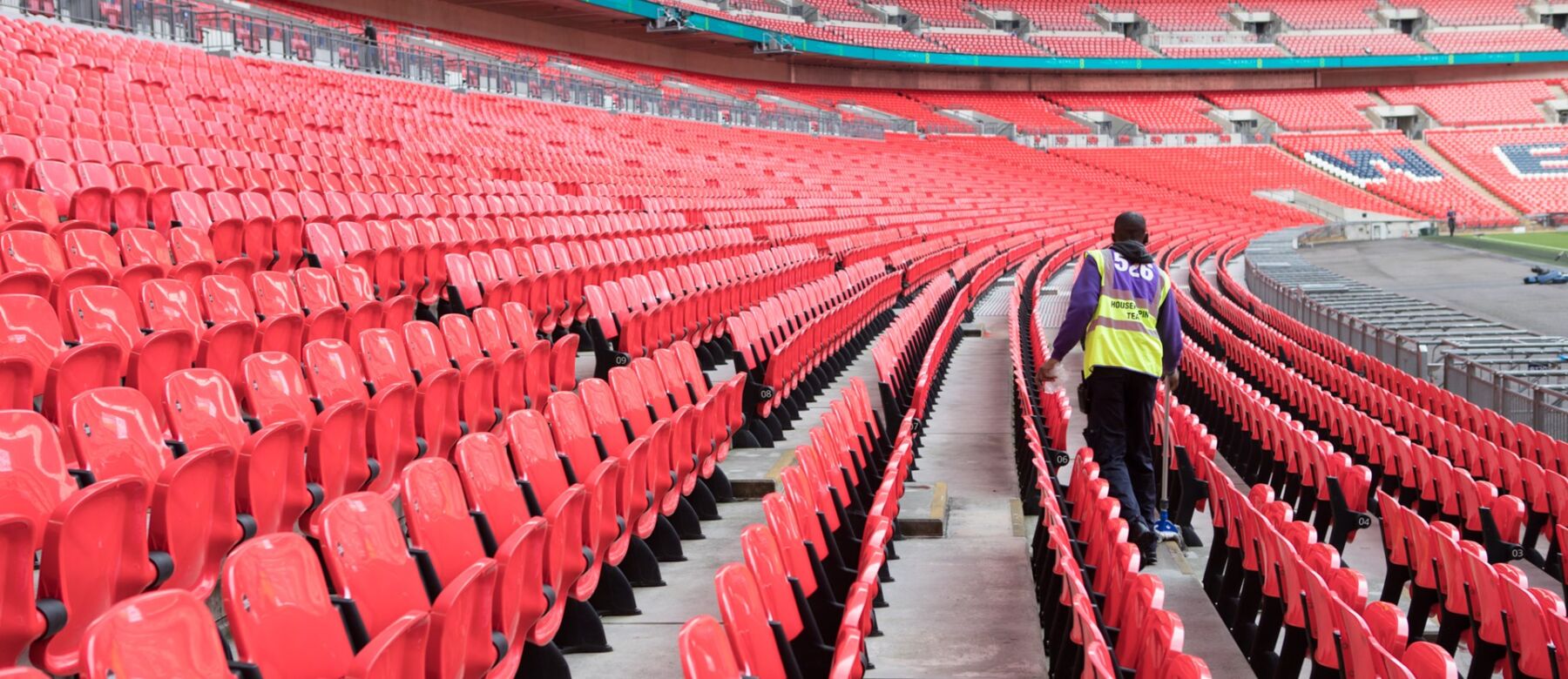 man cleaning the stadium