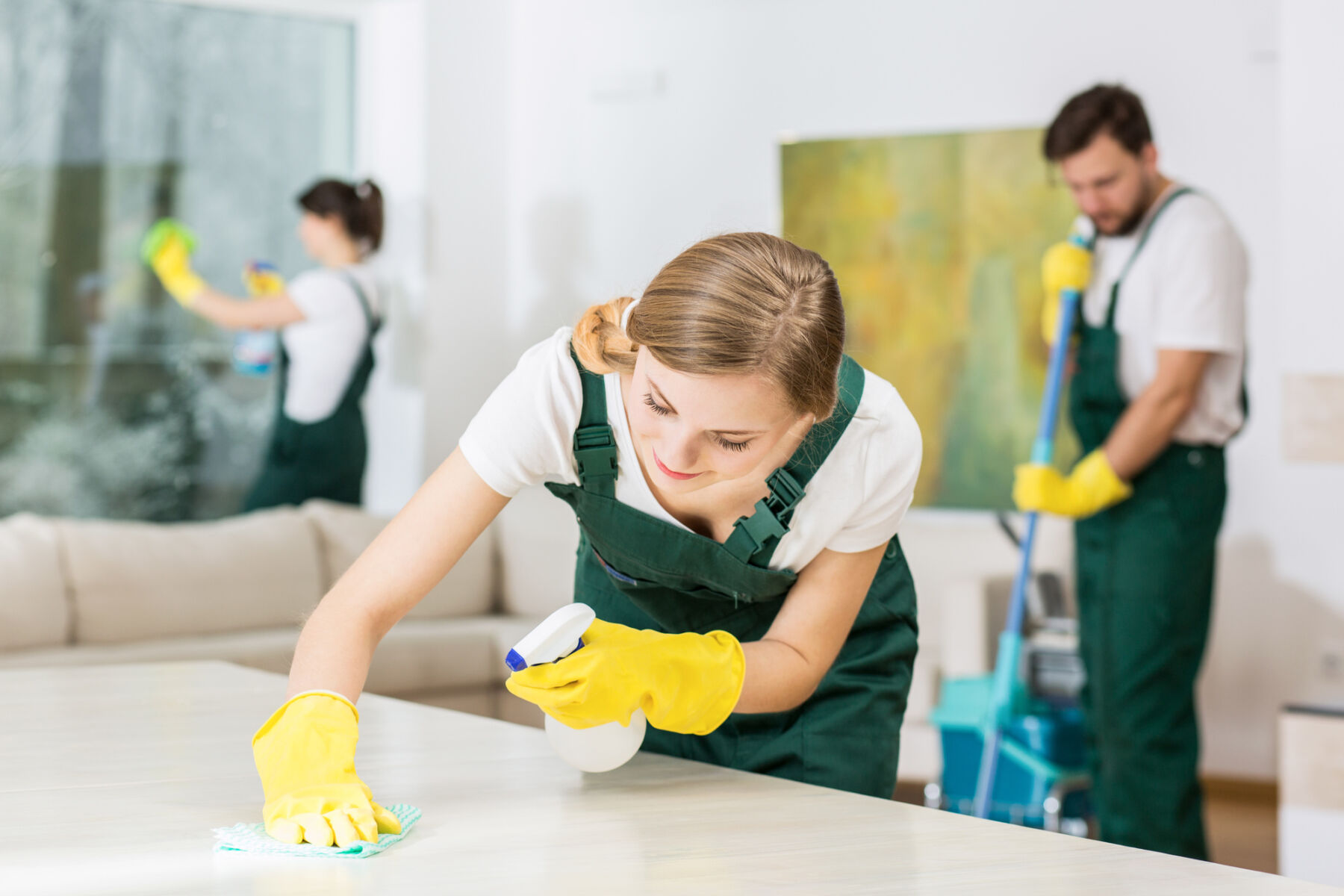 Pretty young girl hardworking as a professional cleaner