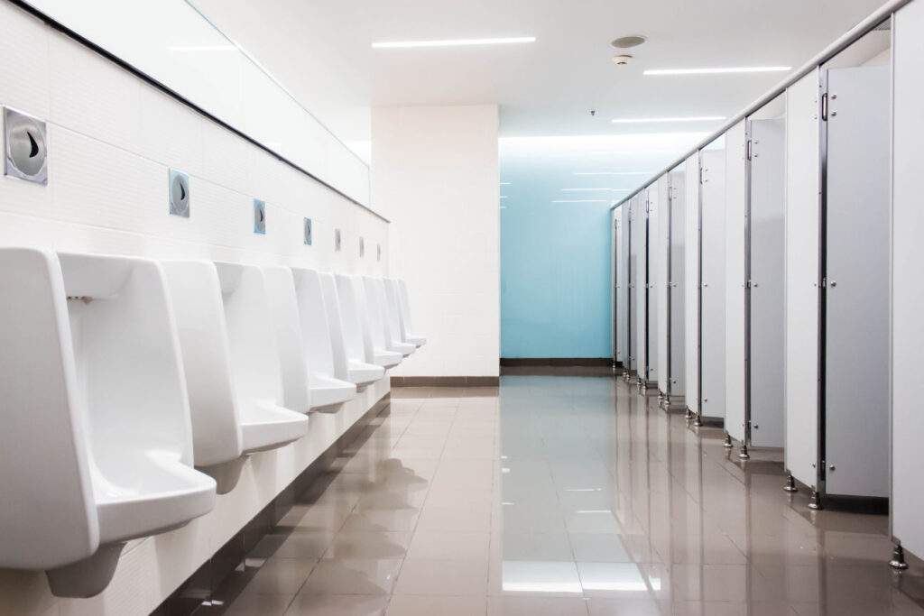 Spotless and sanitary commercial bathroom, emphasizing cleanliness for health and safety.