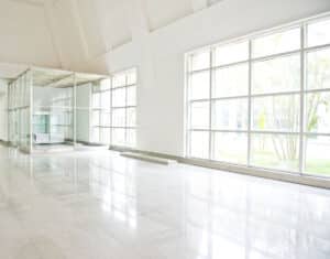 23534258 - empty long corridor in the modern office building.