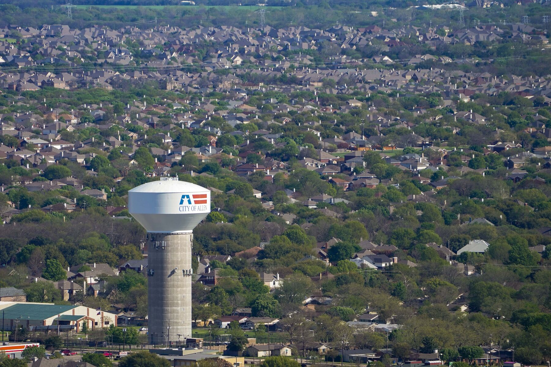 Aerial view of water tower and residential neighborhood in Allen, Texas on Tuesday, March 24, 2020. (Smiley N. Pool/The Dallas Morning News)