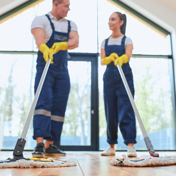 Professional floor mopping team