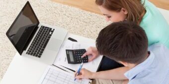 A man and woman calculating finance