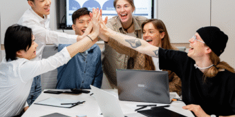 office team Six people having office meeting and doing high five